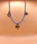 necklace with blue beads and animal print heart