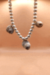 necklace with pearls and sea snails