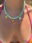 Handmade Necklace With Aqua Beads and golden charms