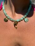 Handmade Necklace With Aqua Beads and golden charms