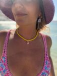 Handmade Necklace with yellow glass beads and stainless steel centerpiece