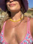 Handmade Necklace with yellow glass beads and stainless steel centerpiece