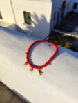 Handmade Necklace with red howlite beads and stainless steel charms