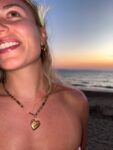 Handmade Necklace with stainless steel heart shaped pendant with flower